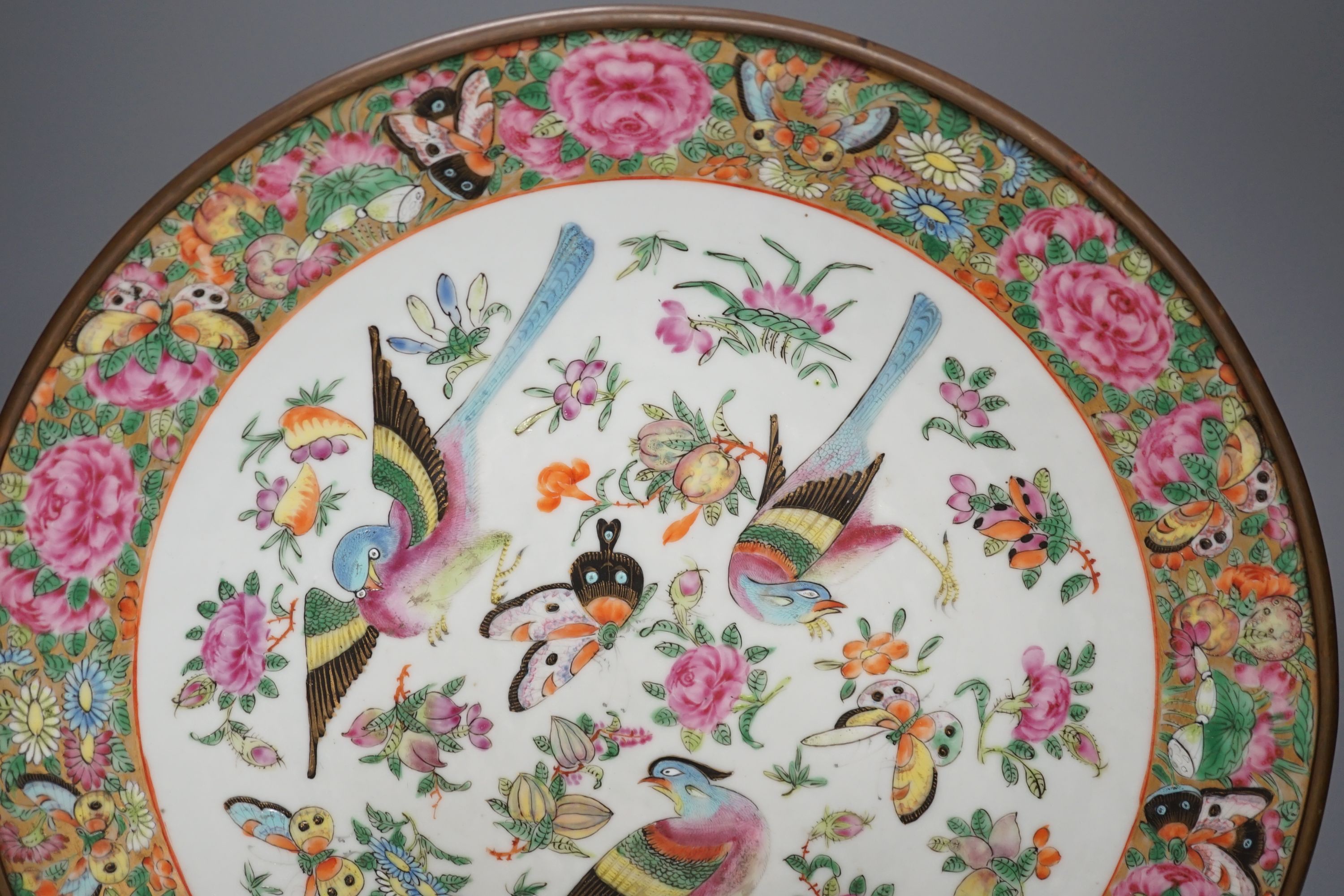 A 19th century Chinese famille rose ‘birds insects fruit and flowers’ dish - 35cm diameter